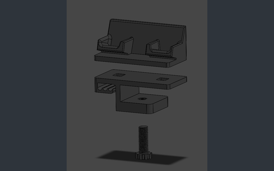 Exploded SOLIDWORKS CAD view of the adjustable desk clamp dock